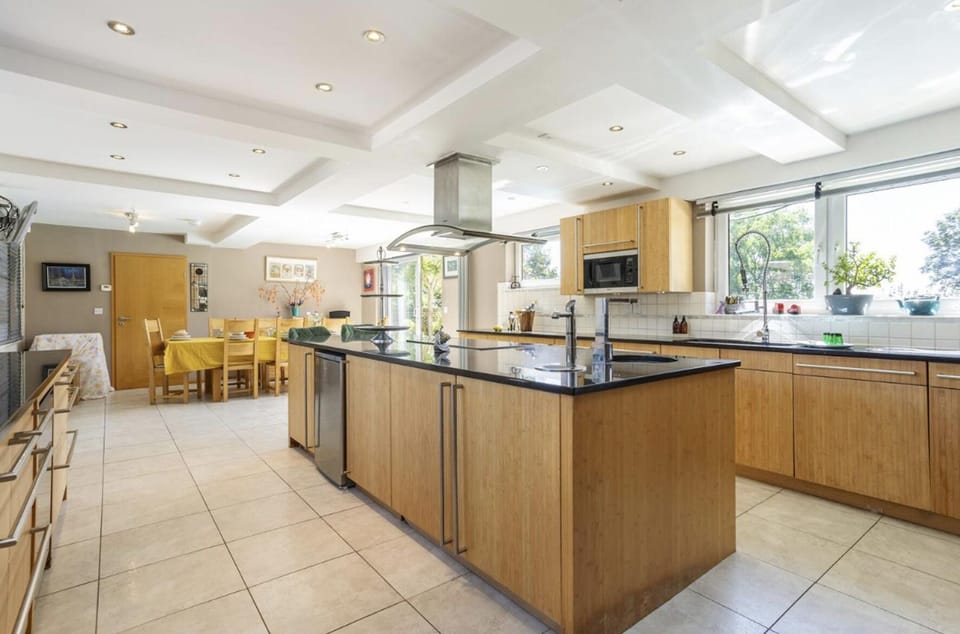 Villa | Private kitchen | Fridge, microwave, oven, stovetop