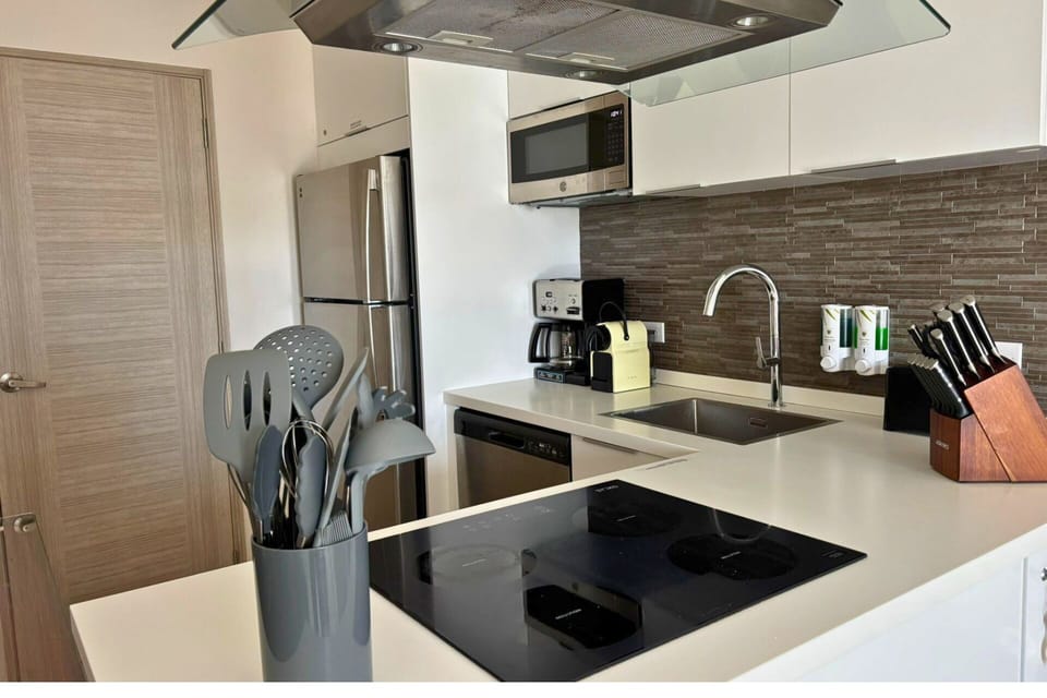 Step into our fully equipped kitchen, designed to meet all your culinary needs