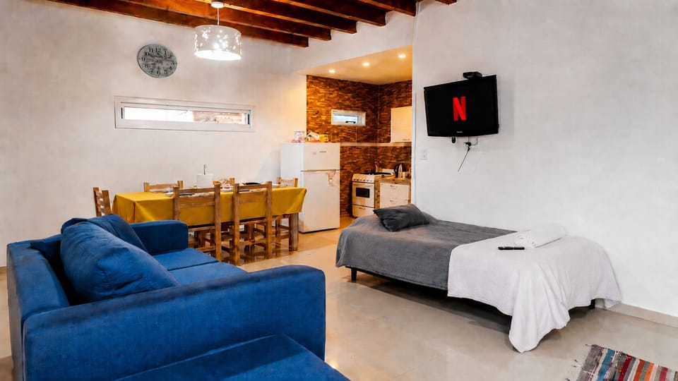 Comfort Apartment, Multiple Beds, Pool View | Living room