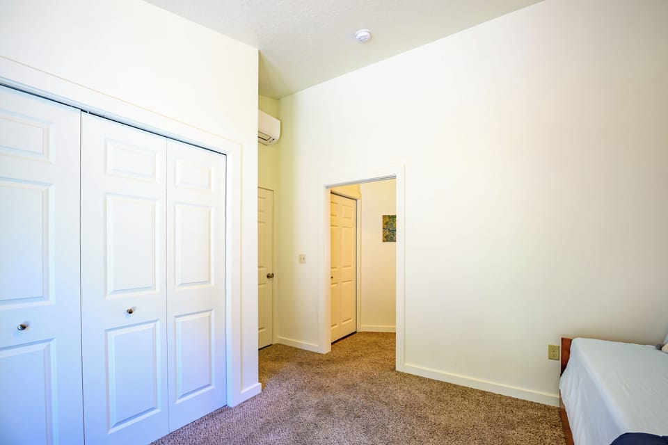 Blue House_Master bedroom is is accessed through 2nd bedroom.