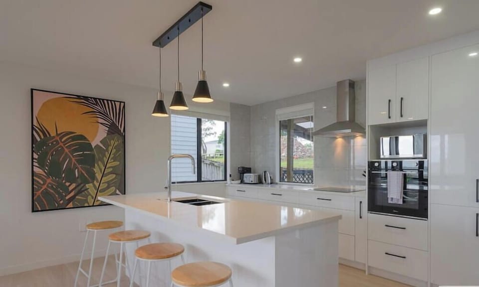 Tidy and Sleek Kitchen with high chair