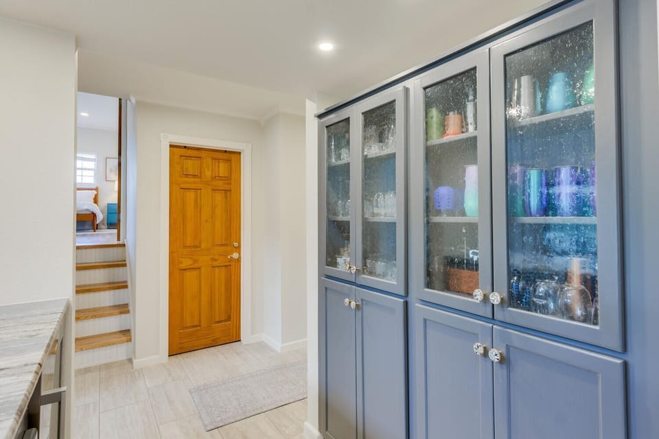 walk up 5 steps into the beautiful primary bedroom