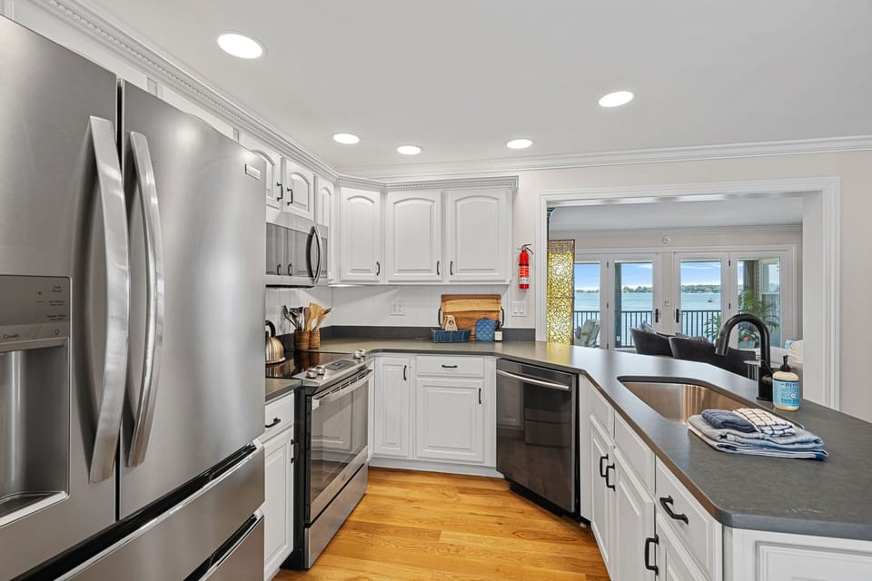 Fully stocked kitchen with large island to prep all your group meals.,