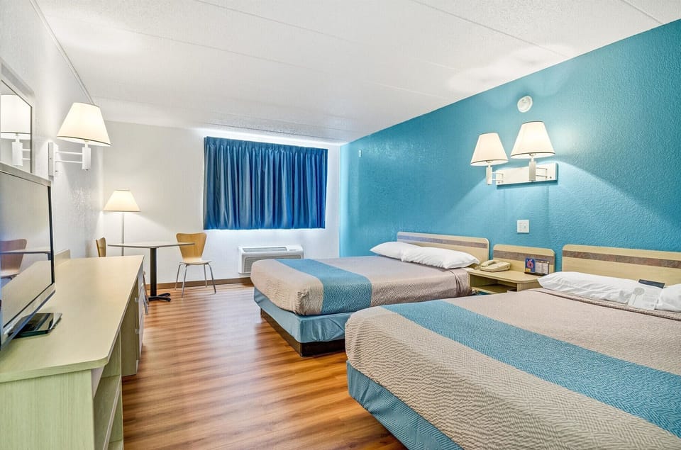 Standard Room, 2 Queen Beds, Non Smoking, Refrigerator & Microwave | WiFi (free), bed sheets