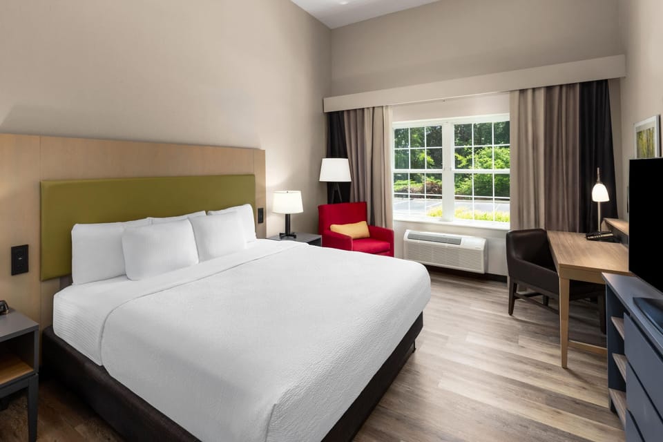 Premium bedding, down comforters, pillowtop beds, desk