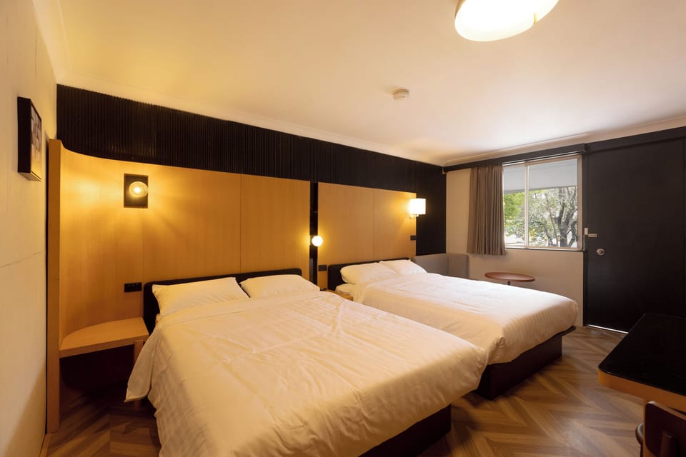 Deluxe Twin Room | Desk, blackout drapes, iron/ironing board (on request), WiFi (free)