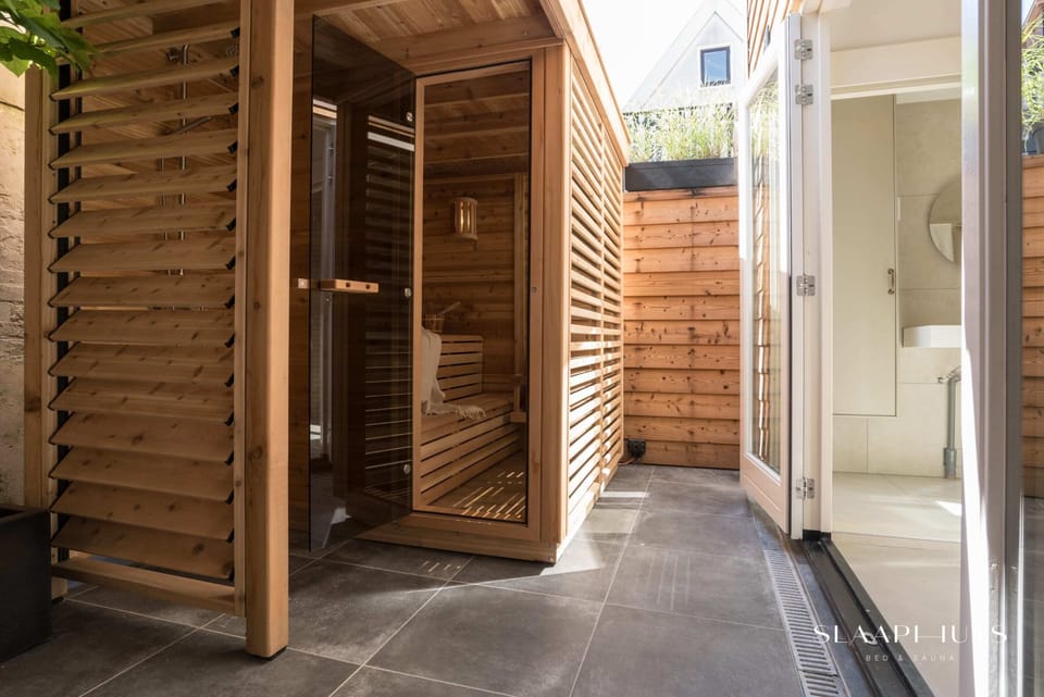 Private outdoor sauna in natural wood — unwind in your own wellness space and recharge in complete privacy and comfort.