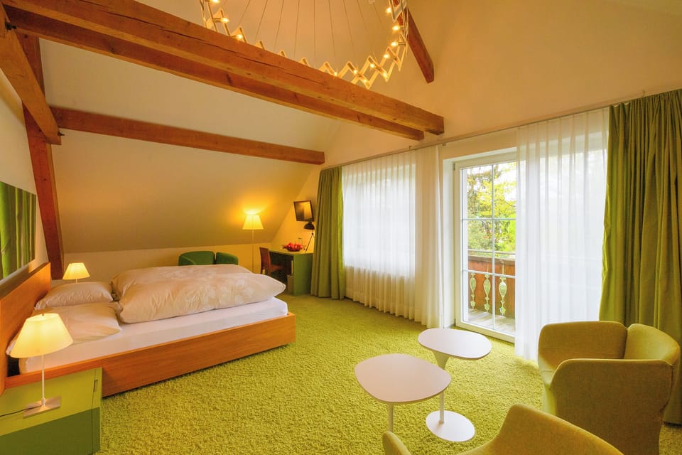Junior Studio Suite, Garden View | Desk, soundproofing, iron/ironing board, free WiFi