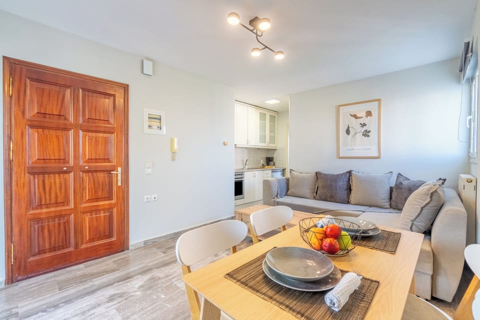 Deluxe Apartment, Sea View | Living area | Flat-screen TV