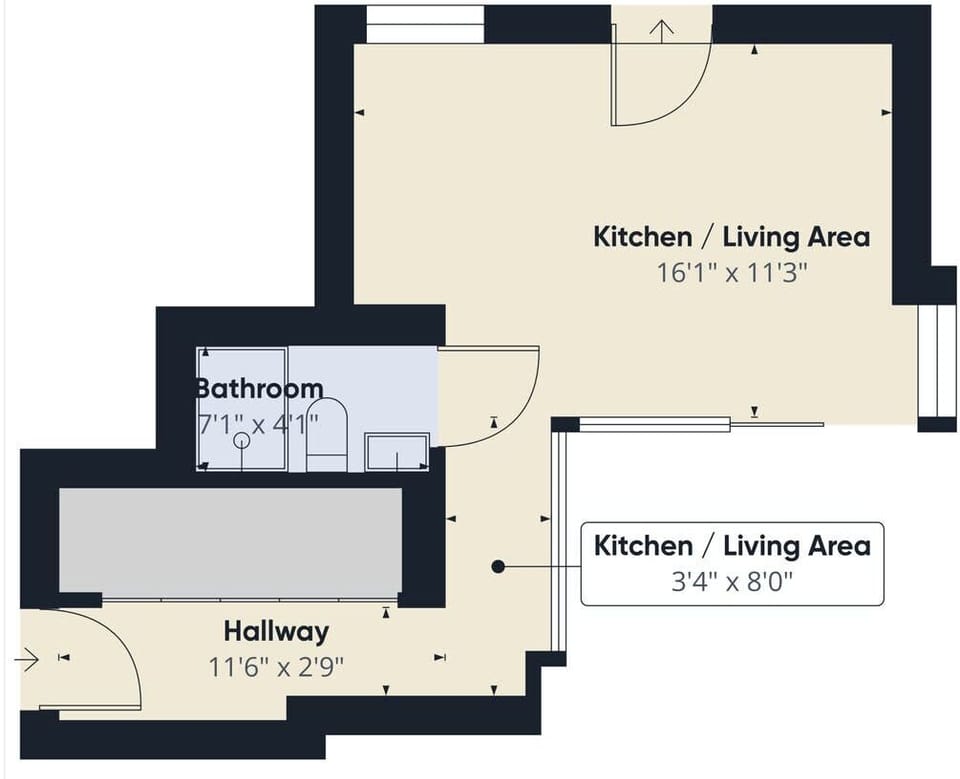 Floor plan showing full layout of apartment including bedroom, kitchen/living area, and bathroom.
