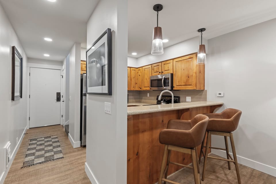 The breakfast bar with seating for two guests.