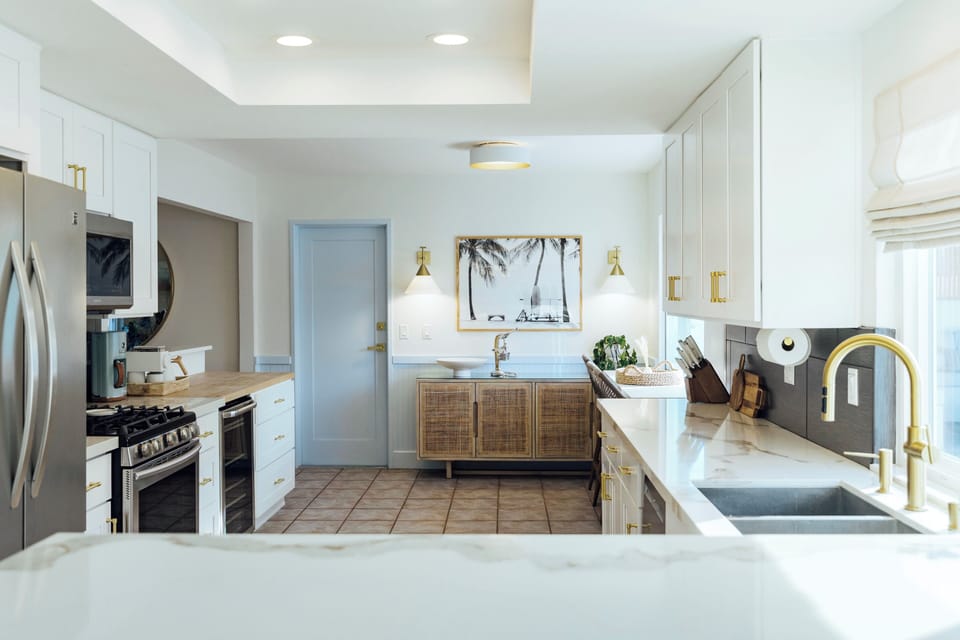 Imagine preparing delicious meals in this kitchen with fresh produce from the farmers market, while sipping a margarita and enjoying the pool view. 