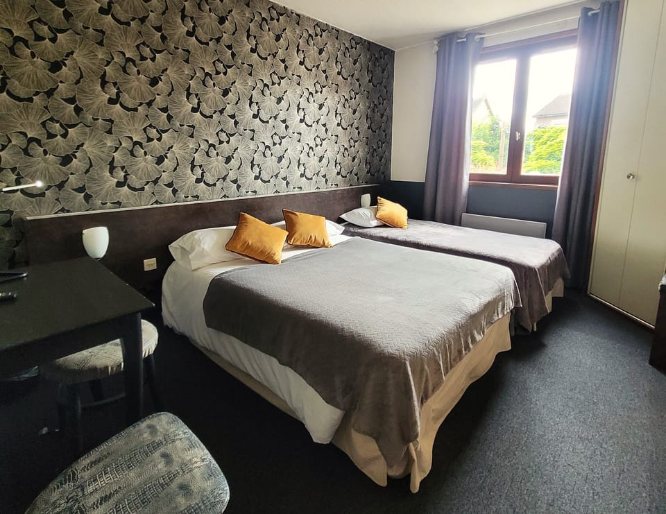 Triple Room, Non Smoking | Individually decorated, desk, laptop workspace, free WiFi
