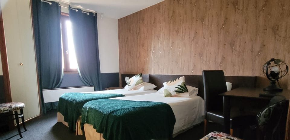 Twin Room, Non Smoking | Individually decorated, desk, laptop workspace, free WiFi