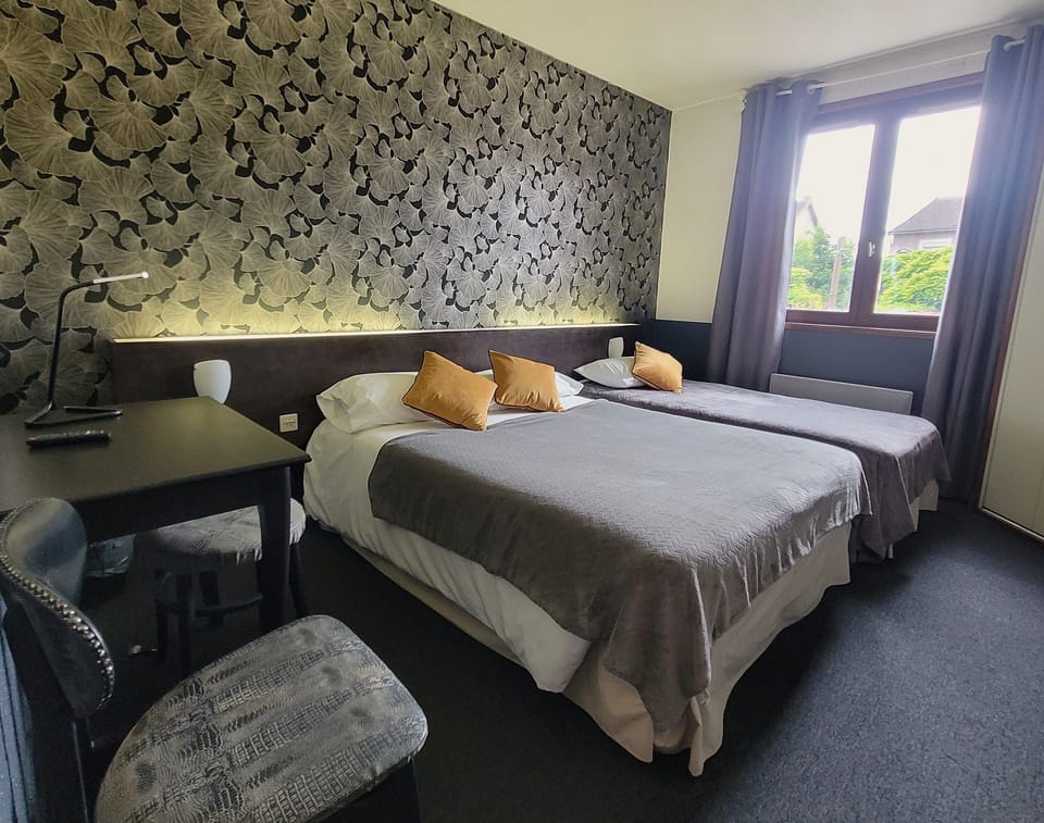 Triple Room, Non Smoking | Individually decorated, desk, laptop workspace, free WiFi