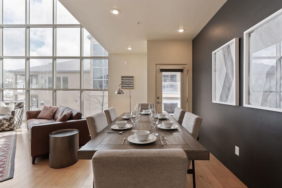 The dining area offers a great view and comfortably seats six, perfect for family meals or gatherings! | The Hillside, Brian Head, Utah | Voyax Luxury Vacation Rentals