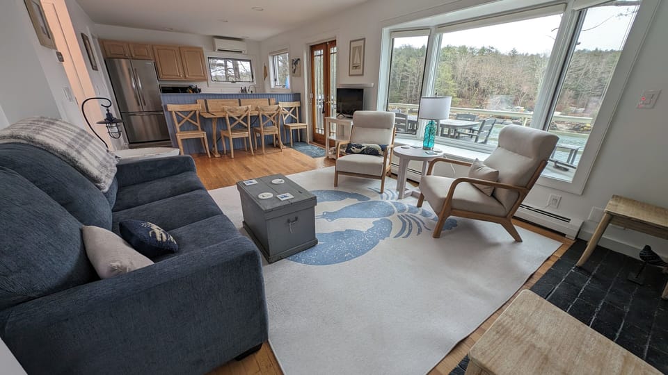 Livingroom flowing into the dining areaand kitchen for easy visiting. 