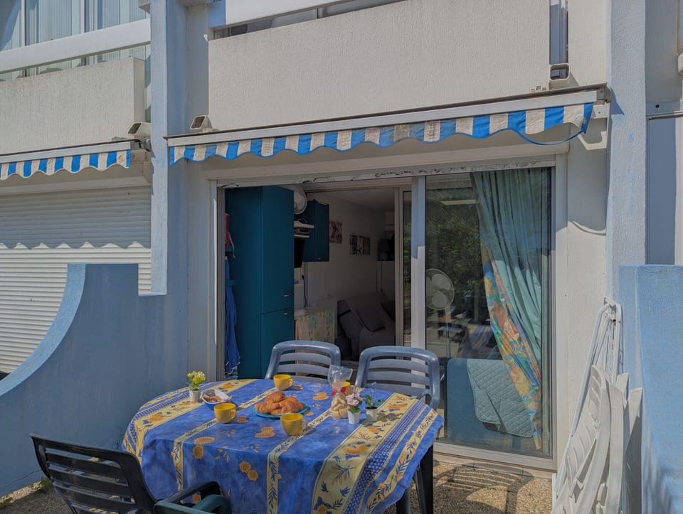 Pleasant terrace on the ground floor with direct access to the closed loggia opening onto the living room