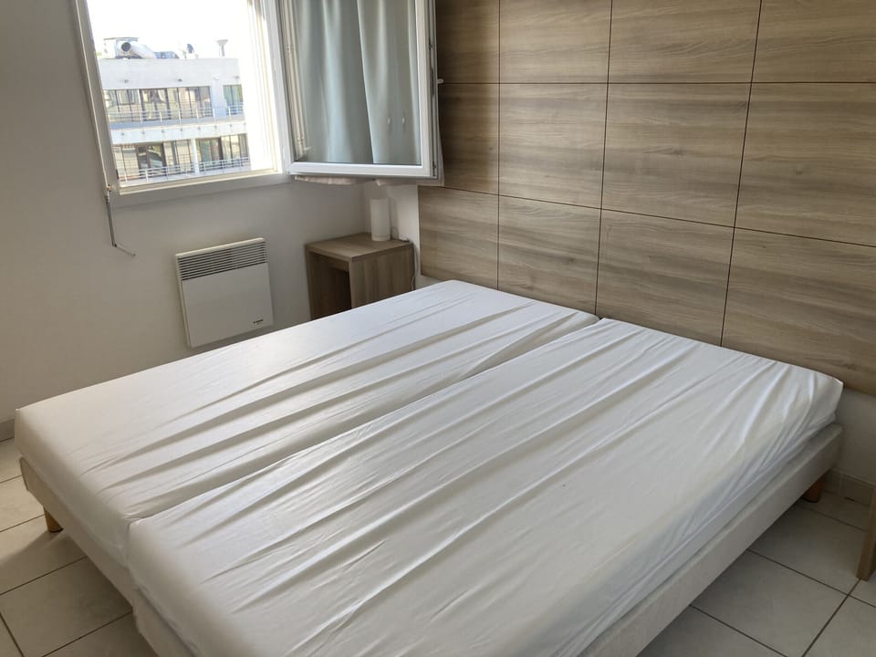 Second bedroom with two single beds ideal for children