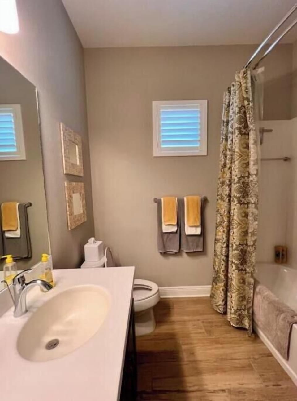 Bathroom 2 with Tub/Shower and linen closet.
