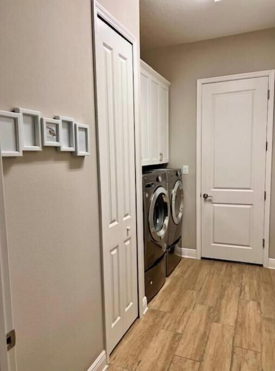 Laundry Room and Garage Entrance.  Front load LG washer and dryer.