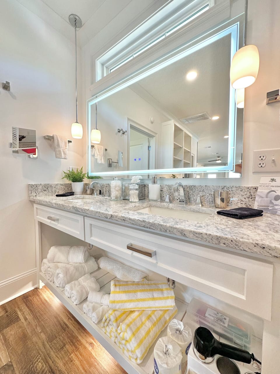 1 of the bathroom vanities. Double sinks with towels provided.