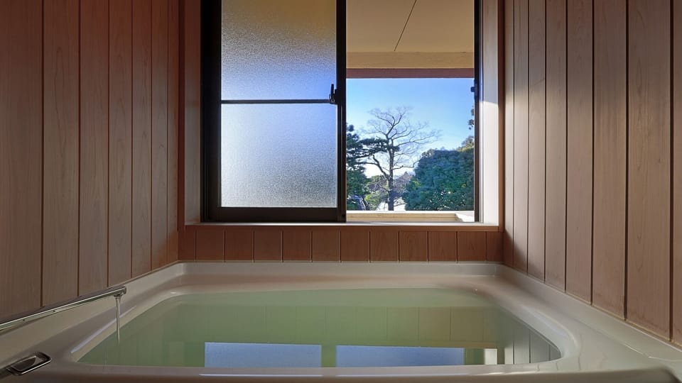Deluxe Japanese Room | Bathroom | Hair dryer, slippers, bidet, towels