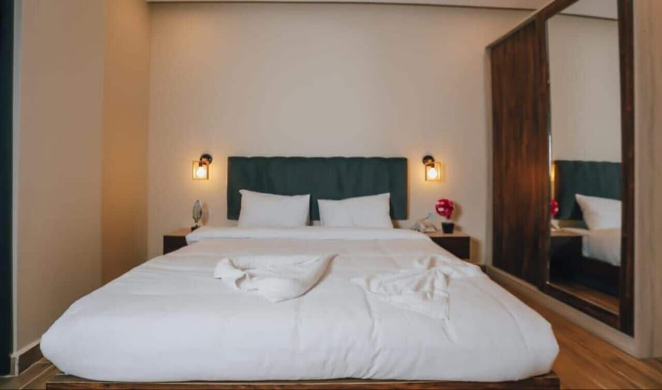 Deluxe Double Room, Balcony, Mountain View | Blackout drapes, iron/ironing board, free WiFi