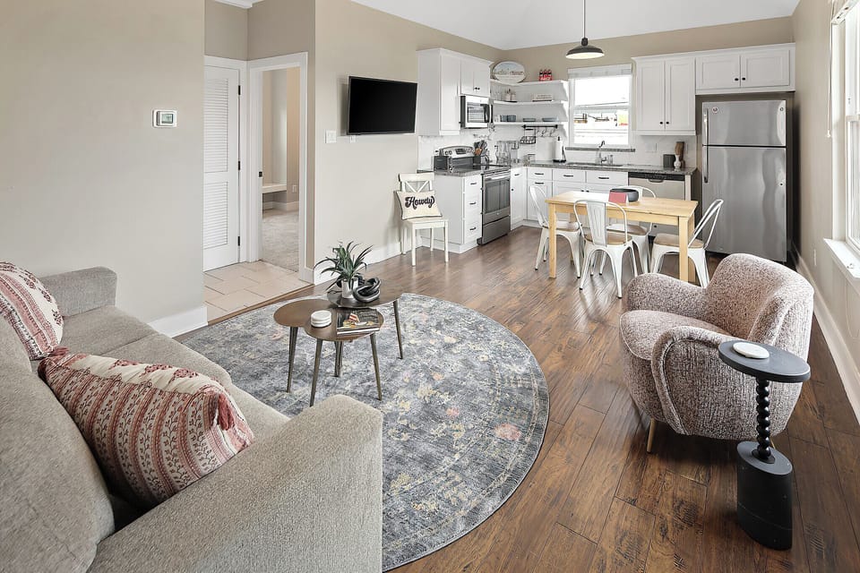 Living Room & Kitchen. Sofa is a Queen Sleeper Sofa