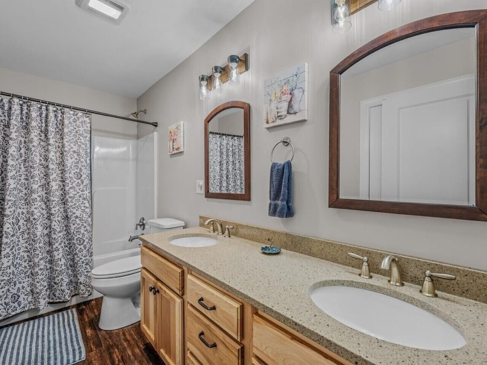 Master bathroom with his and her sinks