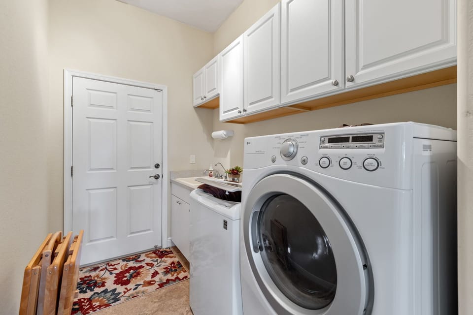 The laundry room comes complete with a utility sink for added convenience.