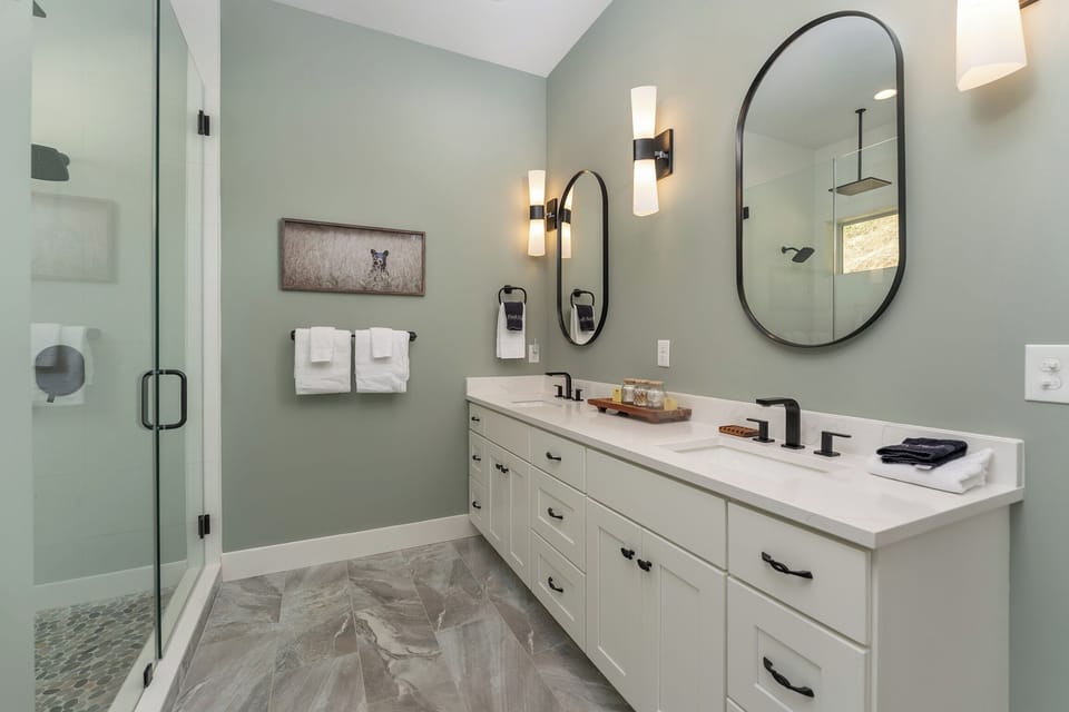 En suite bath with walk-in shower.