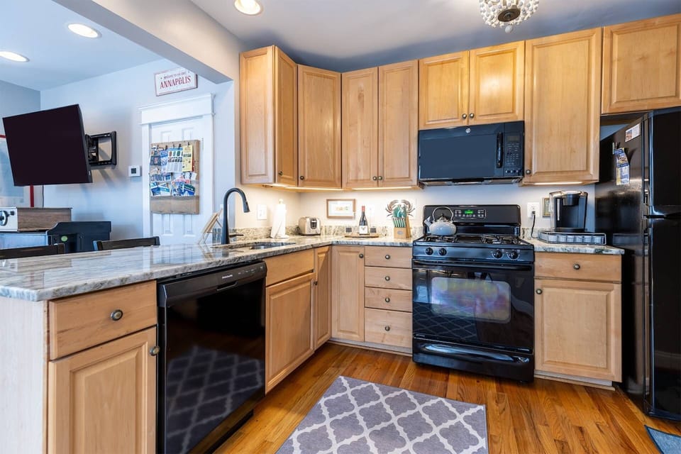 Each unit has its own full kitchen. The first floor's kitchen is located off the family room and is ready for your weekend dinner plans!