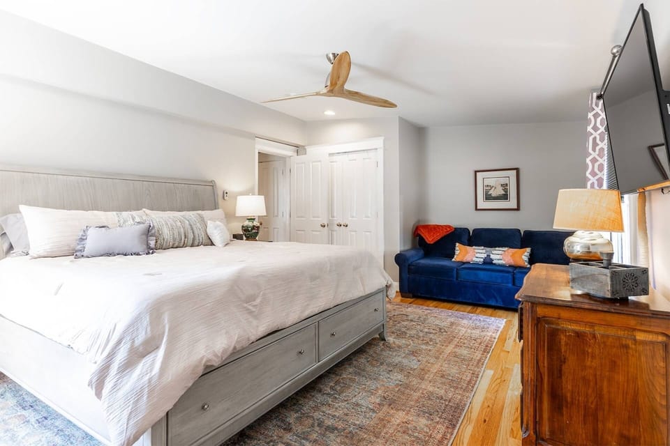 There is a King bedroom in each of the units, the main floor King bedroom includes a TV and a Full sleeper sofa.