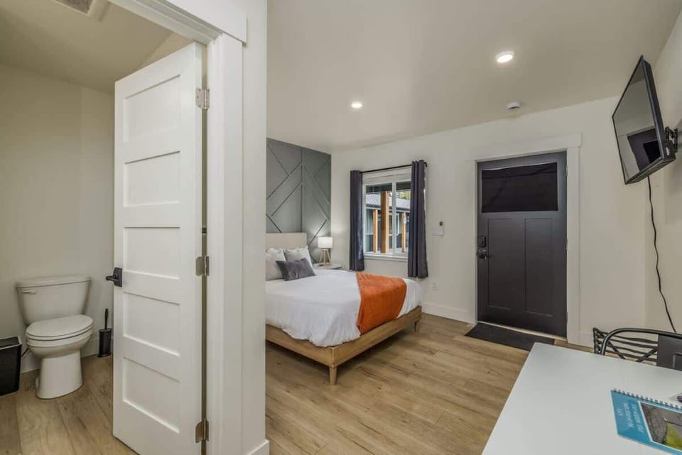 Easy access to the living room and bathroom for added convenience.