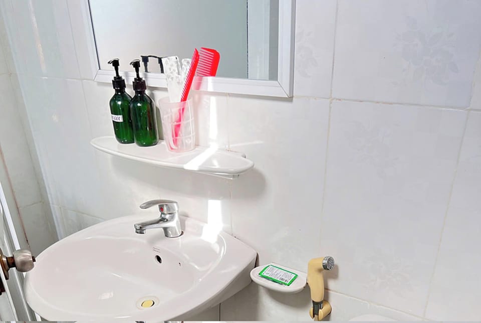 Shower, rainfall showerhead, designer toiletries, hair dryer