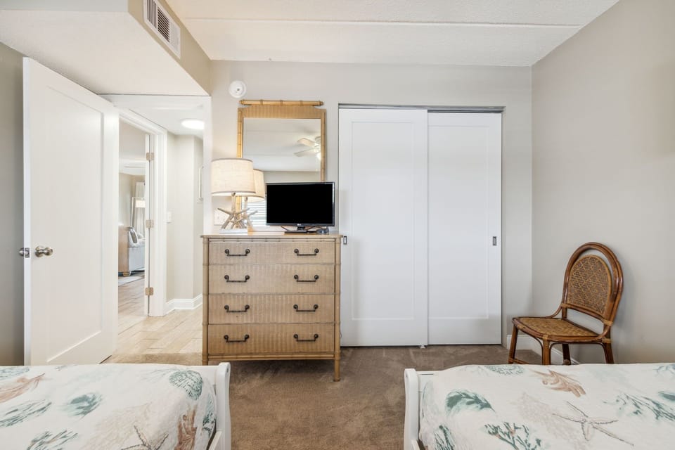 Guest Bedroom with Dresser, TV and Closet