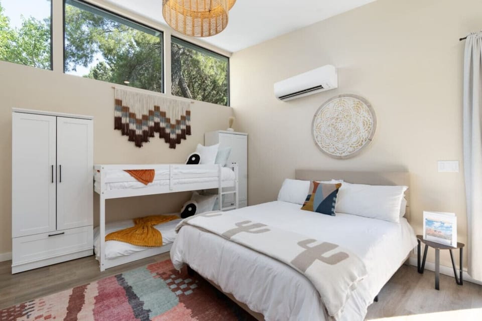 Cozy queen bed & fun twin bunk—perfect for families or small groups!
