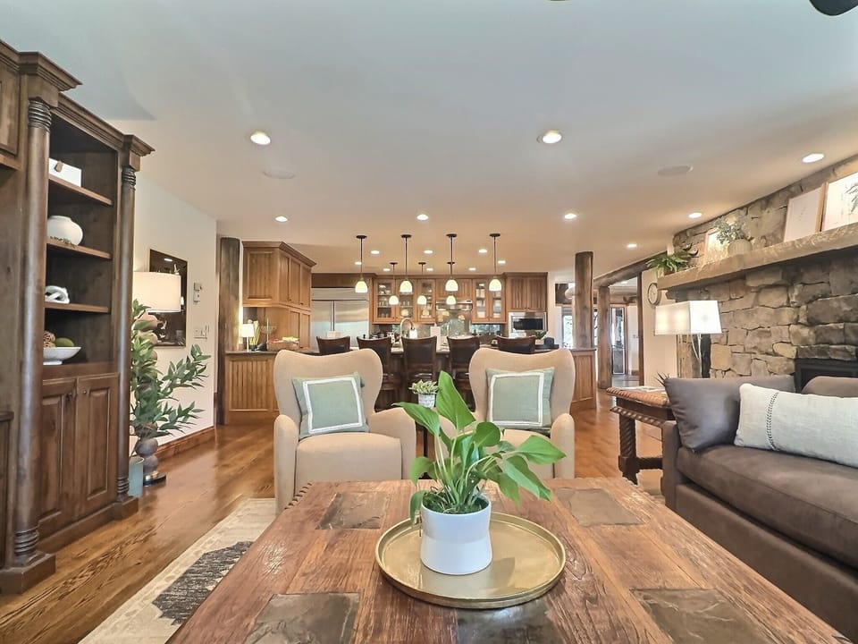 Open Concept Living — Seamless flow between kitchen and living spaces makes gathering effortless for the whole group. 🏡✨