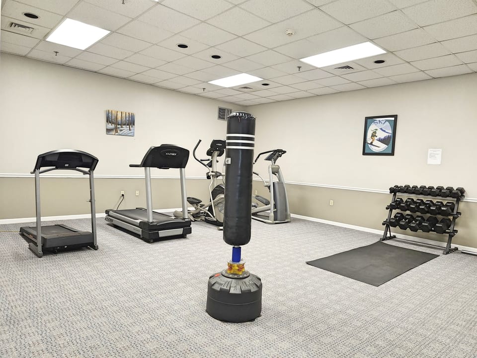 Exercise room downstairs past pool