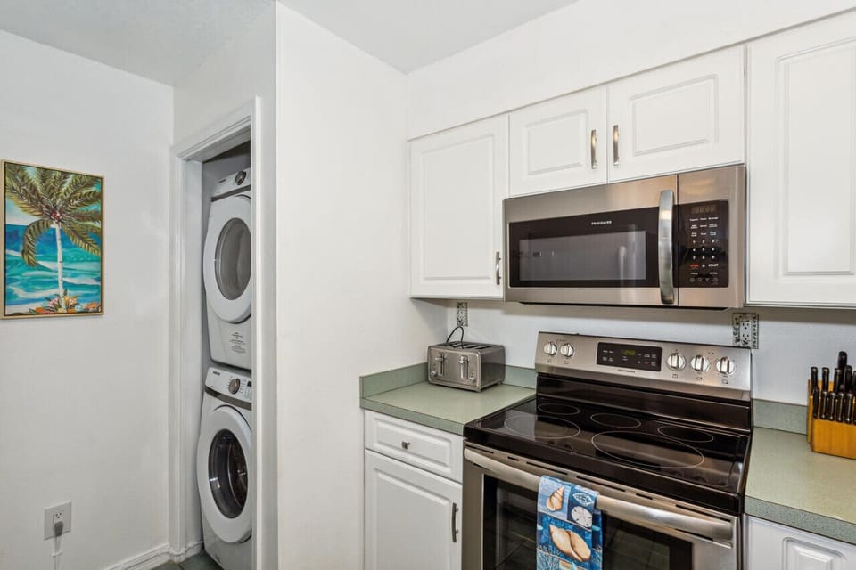 Full Size Washer and Dryer in Kitchen Area