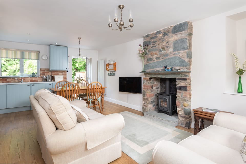 From the hallway you can access this charming open plan living/dining and kitchen area
