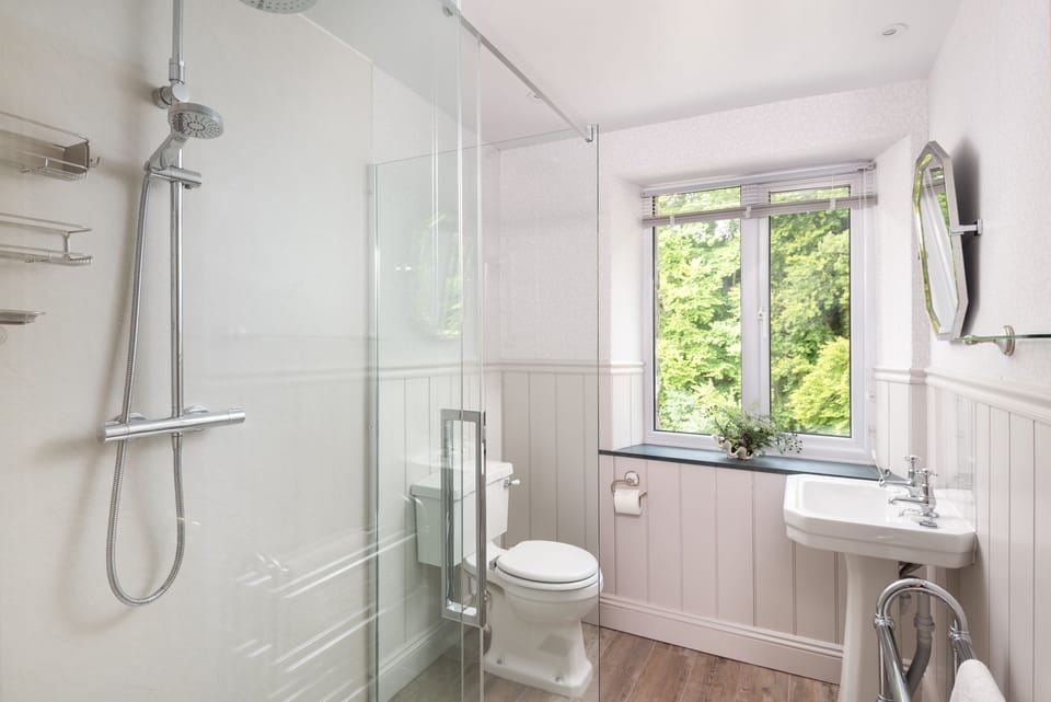 Upstairs washroom with monsoon shower