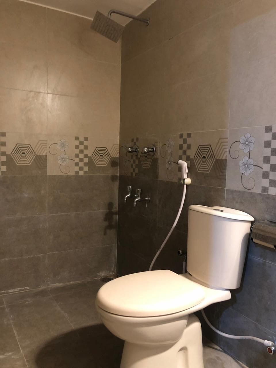 Separate tub and shower, slippers, towels, soap