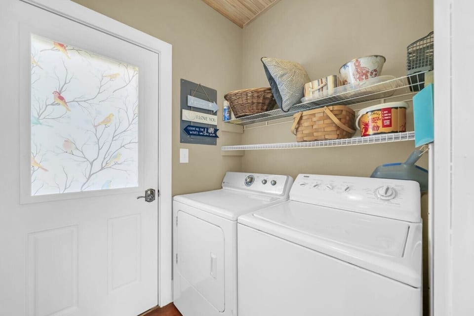 Laundry room located just off the kitchen.