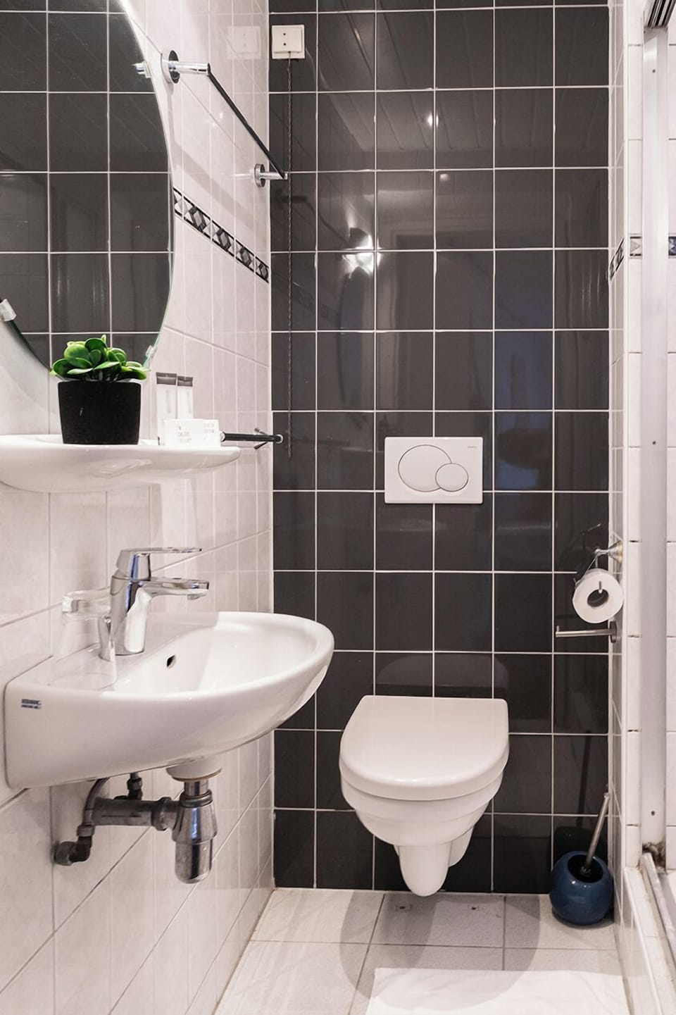 The private bathroom includes a  shower and all necessities