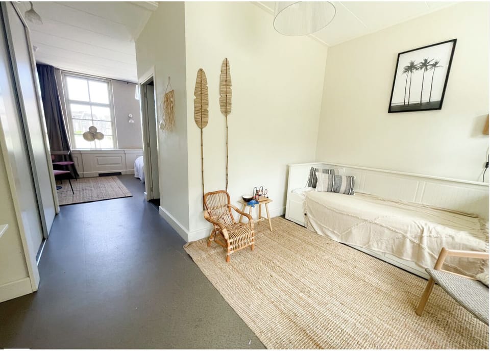 Cozy living area with seating, a great place to relax together.