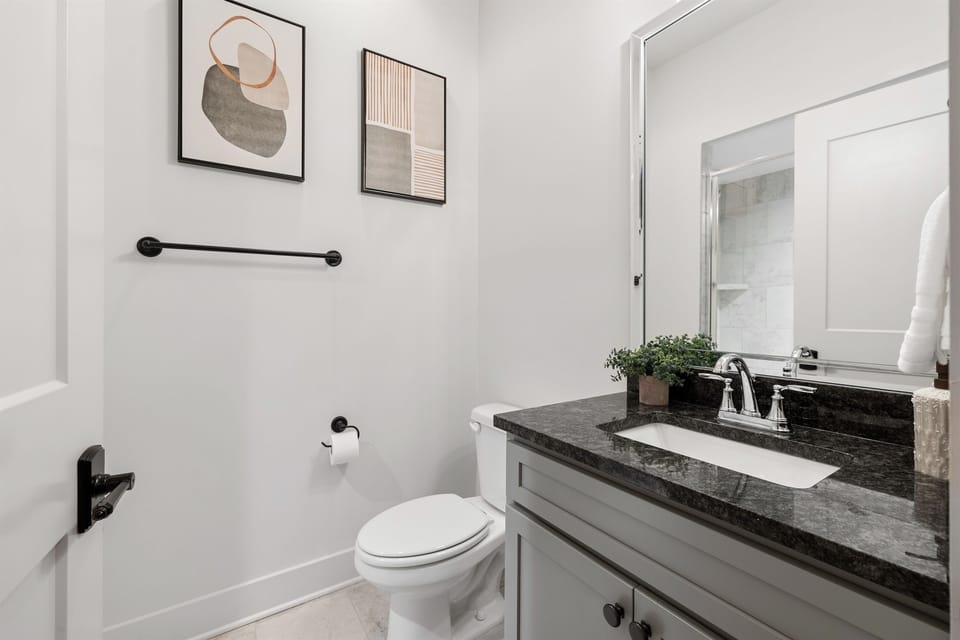 Private Bathroom with tiled shower