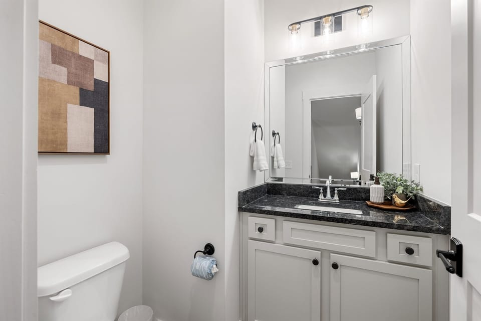Half bathroom off of the living room