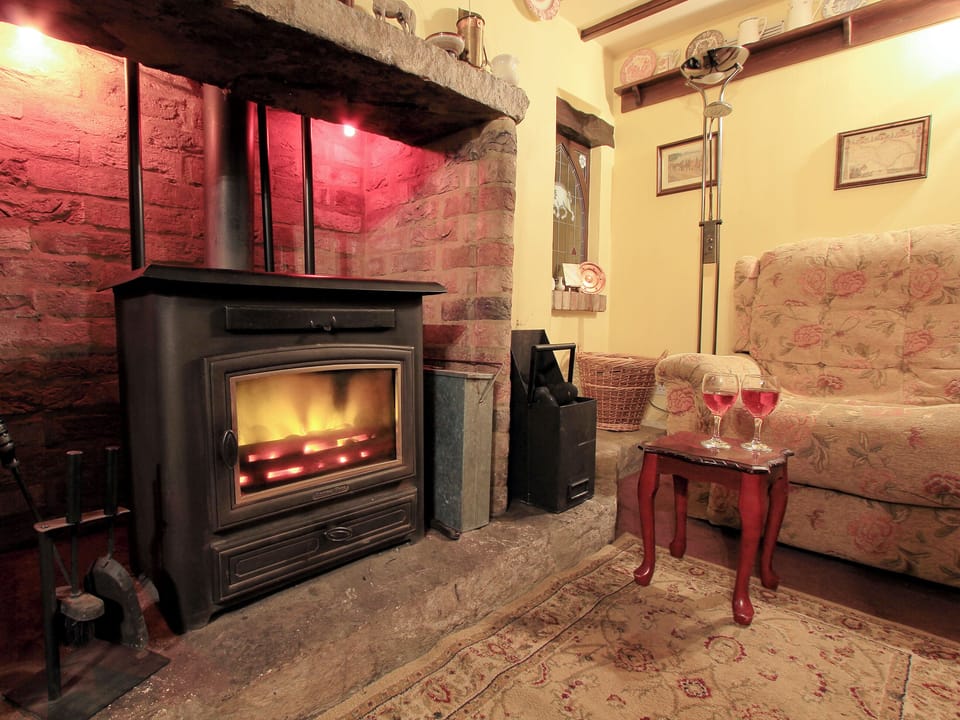 Living room with multi-fuel stove and exposed beams | Stonecroft, Middleham, near Leyburn